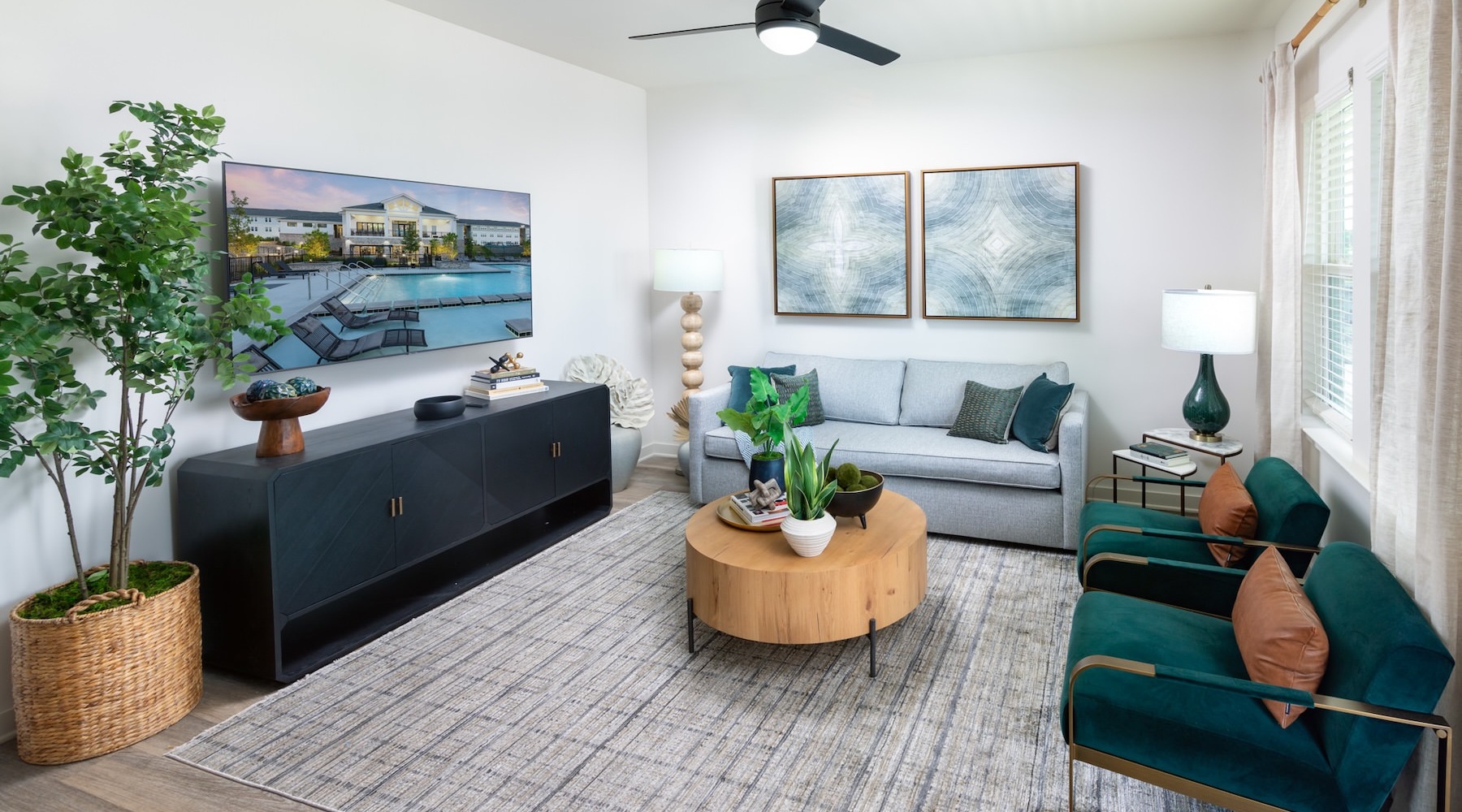 a living room with couches and tables